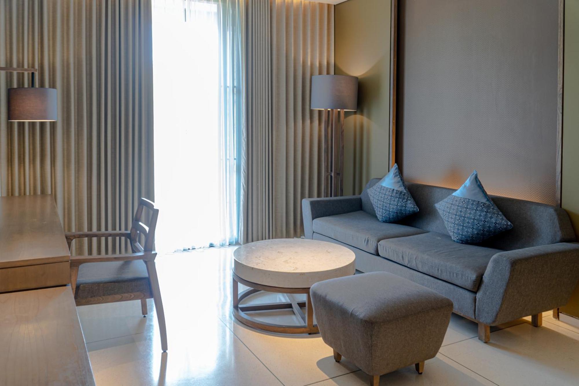Wyndham Tamansari Jivva Resort Bali Siyut Exterior foto A living room at the hotel