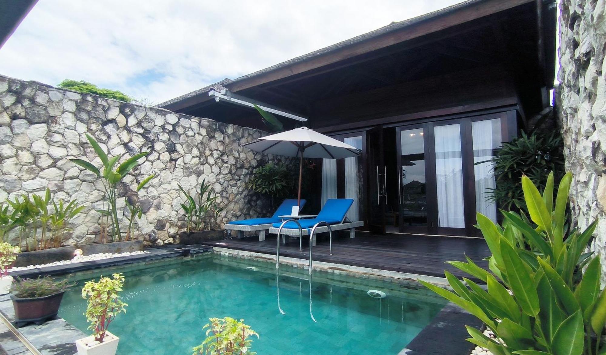 Wyndham Tamansari Jivva Resort Bali Siyut Exterior foto A pool villa at the resort